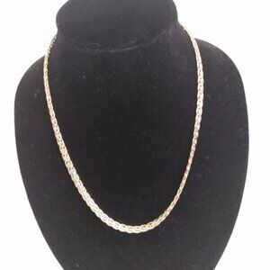 J. C.: Golod tone chain necklace.
